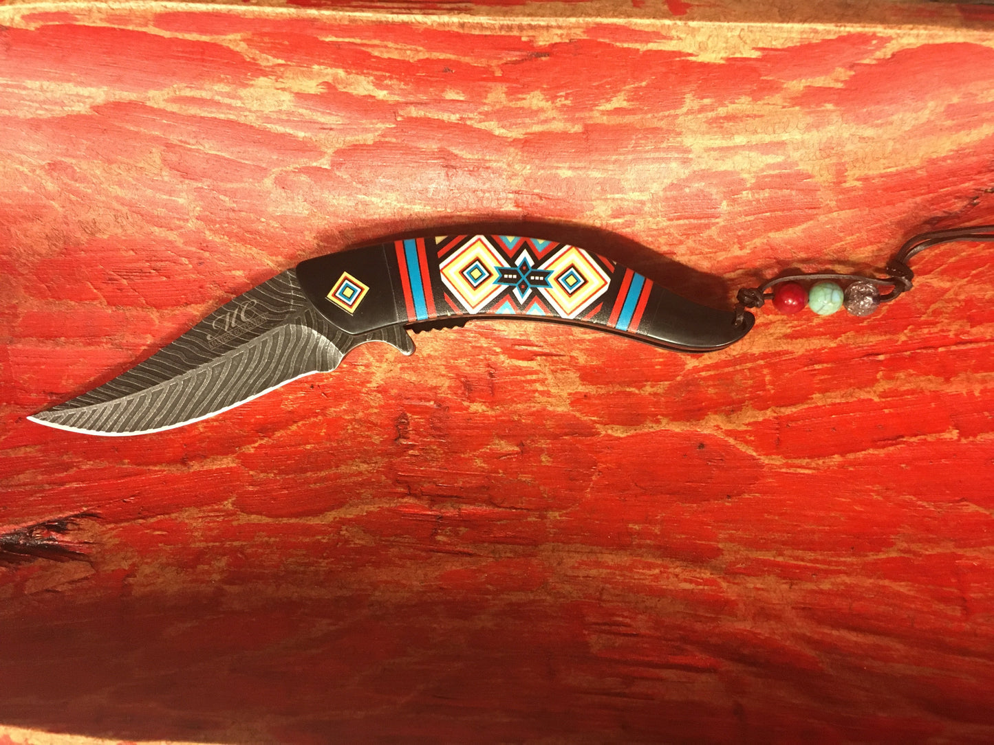 MC-A023BK Western Fashion Feather Aztec Black Folding Knife